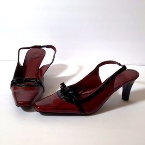 Red patent leather pumps